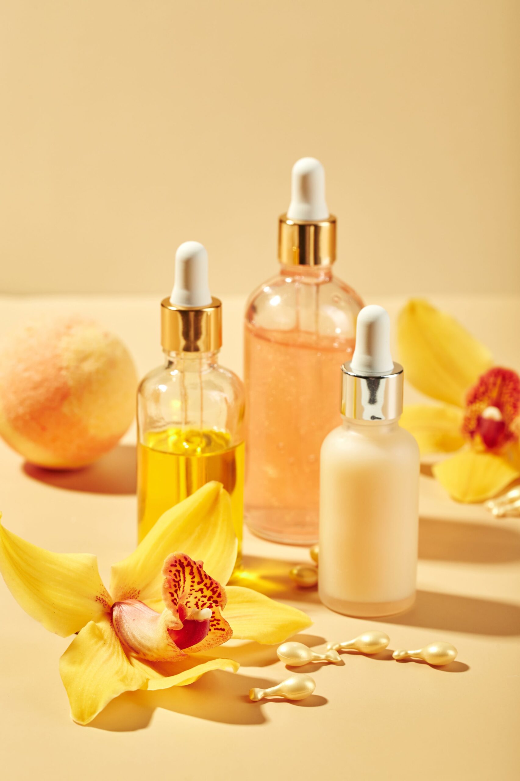 cosmetic-care-products-in-glass-bottles-with-orchi-2022-01-14-15-49-34-utc (1)